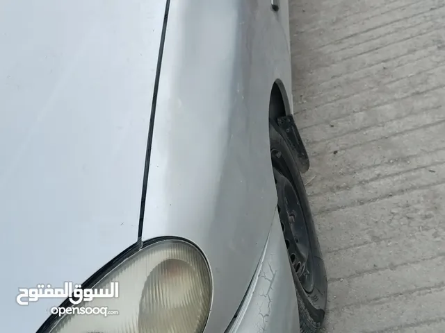 دايو لانوس 97 جديده رقم بغداد تحويل مباشر كير اوتو محرك مكفول حداديه جديده تخم تاير كهربائيات كامله