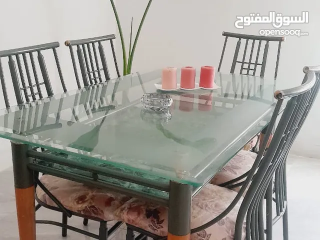 طاوله سفره زجاج مع سته كراسي