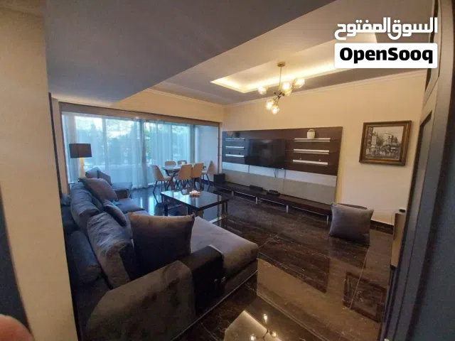 شقة فاخرة مفروشة بالكامل في الطابق الارضي للإيجار في عبدون
