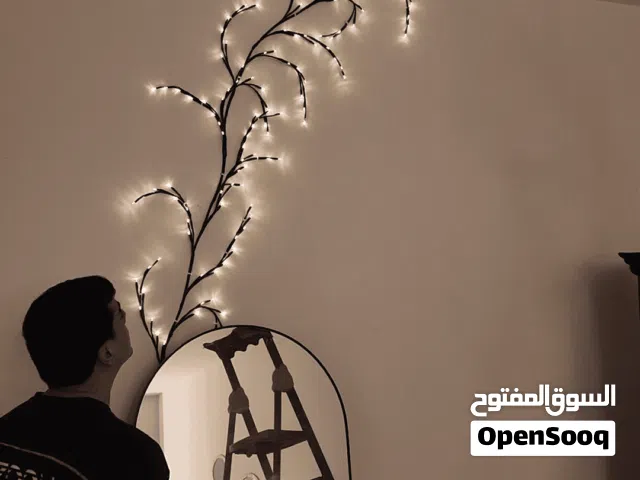 إنارة جدارية بشكل شجرة