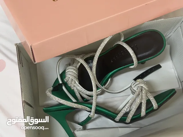 Green With Heels in Ajman