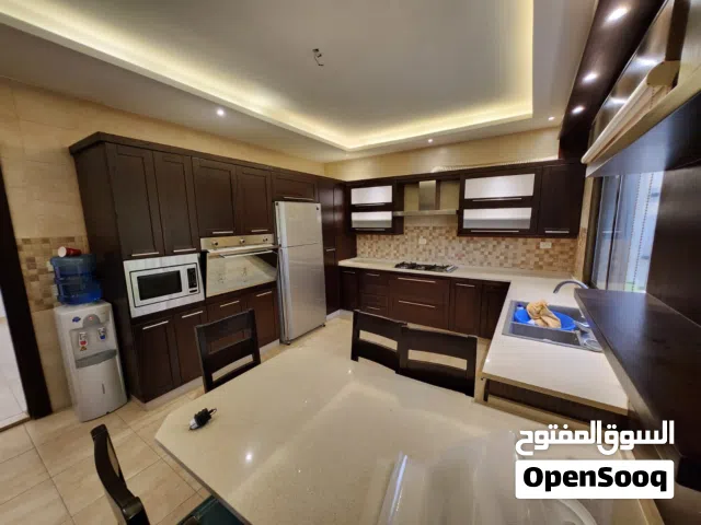 شقة طابق اول بأجمل مناطق الرابية  Ref:106