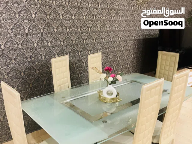 6  seater glass table  with extension