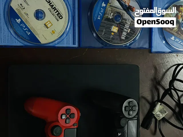 Sony PS4 with complementary games and controllers.
