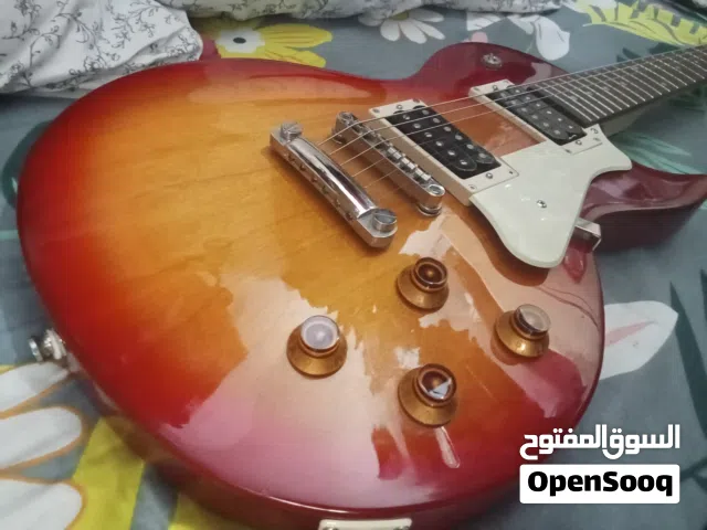 Cort Les Paul r electric guita with Marshall amplifier