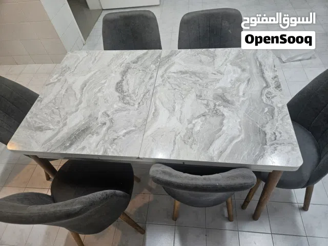 Dining table and 6 chairs