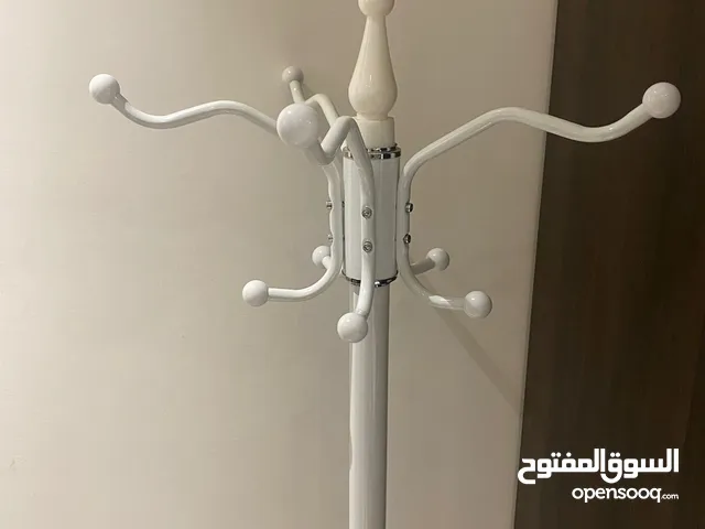 Clothes hanger with marble base.
