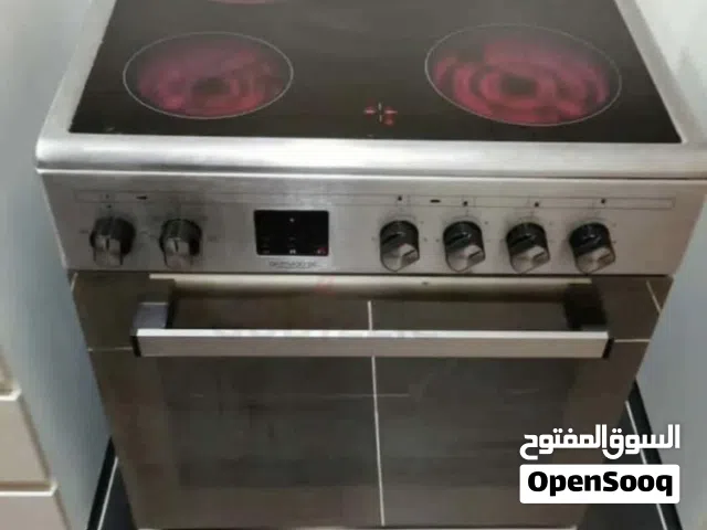 "4-burner electric cooker/range in good condition. All ceramic burners are fully functional, but the