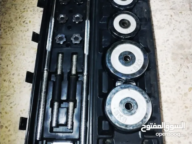 شنطة اثقال تحتوي بار ودامبلز واوزان و بنش متحرك