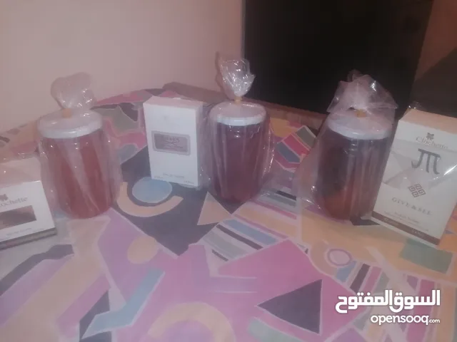 ثلاث كيلو عسل و ثلاث قزايز عطر بسعر مغر واصلي و جرب قبل ماتشتري