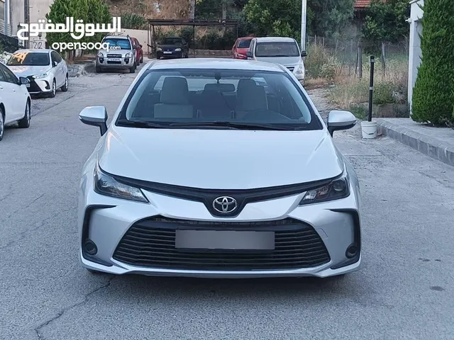 تويوتا كورولا 2021 لون سلفر بنزين اصلي فحص كامل جمرك حديث كاش واقساط