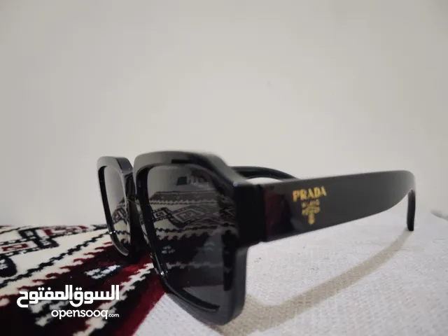 PRADA New sunglass just buy .good price .very good quality .it's showroom price 1700 sr.