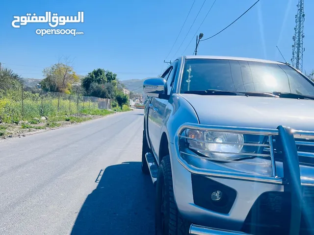 L200... للبيع بسعر مناسب فحص كامل 7جيد 2013