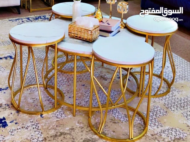 طربيزات معدنية مودرن وجه زجاج او خشب عدد 4 سيرفيس و 1 كبيرة جميع الاشكال مستطيل دائري بيضوي