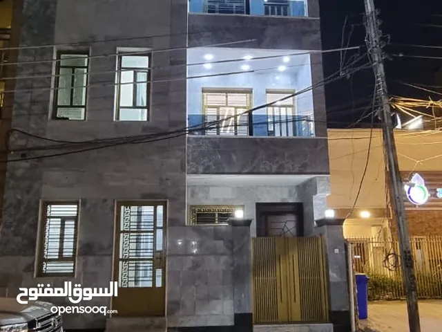 بناية تجارية - سكنية للبيع في المنصور
