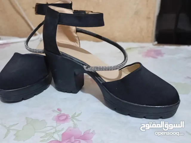 Black With Heels in Zarqa