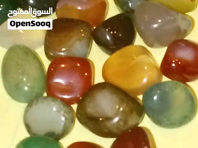 حجاره احجار كريمه عقيق و يماني و اوبال حجر القمر زمرد فيروز كهرمان  حجم معدل 2 سم
