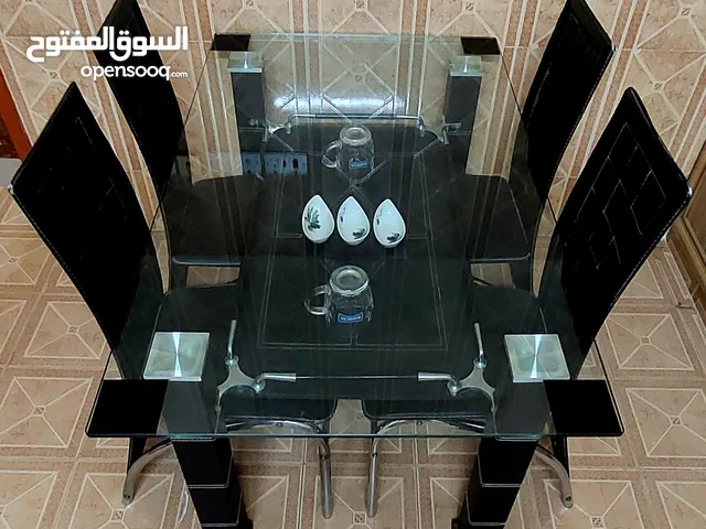 Dining table with 04 chairs. طاولة طعام مع 04 كراسي
