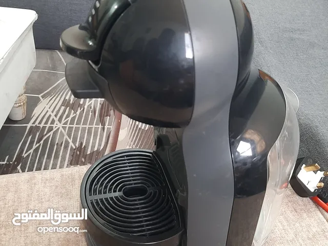 ماكينة صنع القهوة كبسولات من دولتشي جوستو ميني مي ديلونجي صناعة إندونيسي شغاله تمام نظيفه جدا