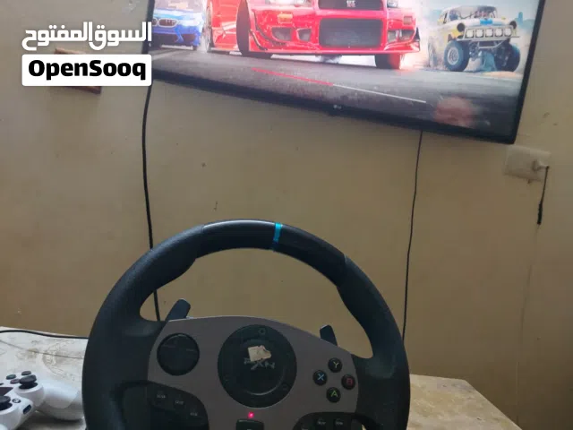 بلاستيشن فور سلم فل العاب ومعو 2 ايادي وحده اصليه وحده كبي