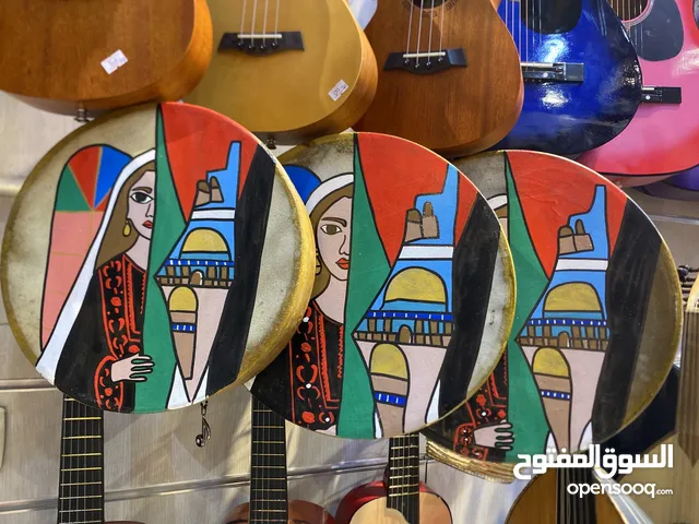 طقم دف جلد ثلاث احجام مشغول رسم ع الوجه