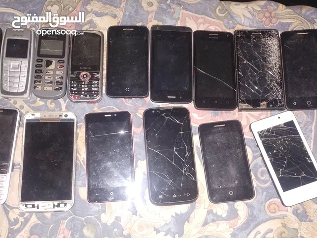 بطاريات مستعملة لهواتف متنوعة و هواتف مستعملة قطع غيار
