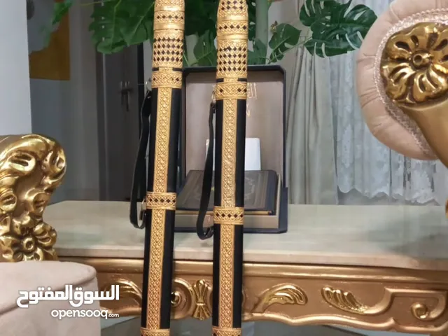 سيوف مطلي ذهب