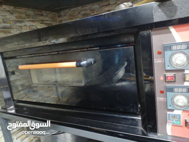 طباخ بيتزا حجري