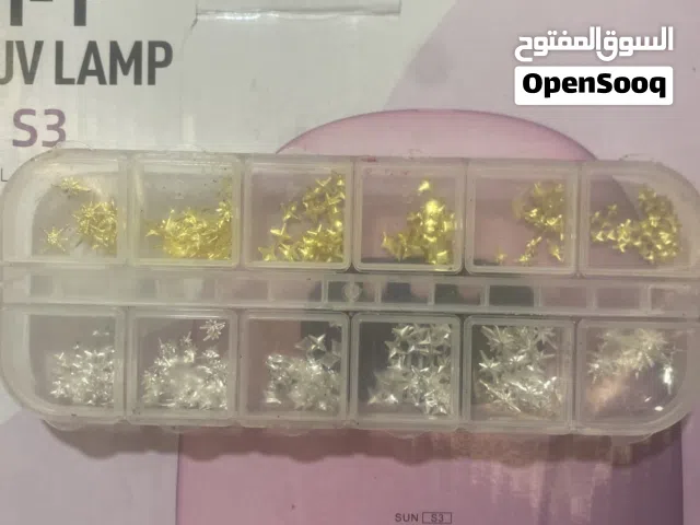 بلك تزيين أظافر ذهبي وفضي على شكل نجوم مستعمل