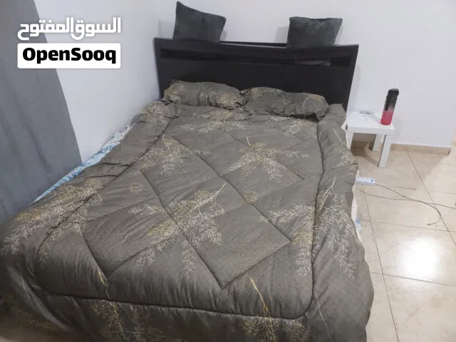 Bed with spring mattress and curtains for sale
