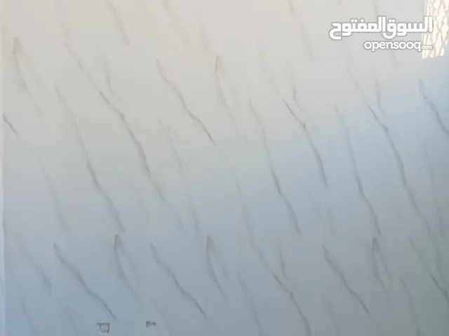 معلم سيراميك كيشاني وسيراميك ارضيات ورخام داخلي وجميع شغل الصيانه