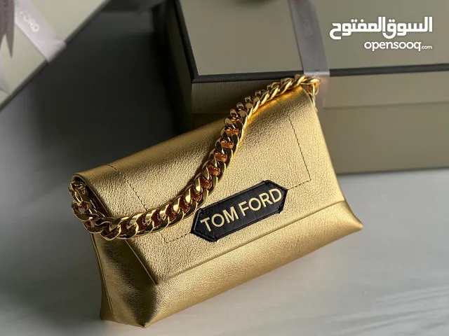 "Unleash your inner gold rush with this stunning purse that's worth its weight in style!"