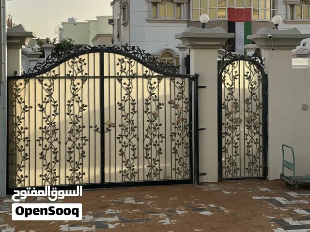 باب فيلا مودرن حديد مع ألواح
