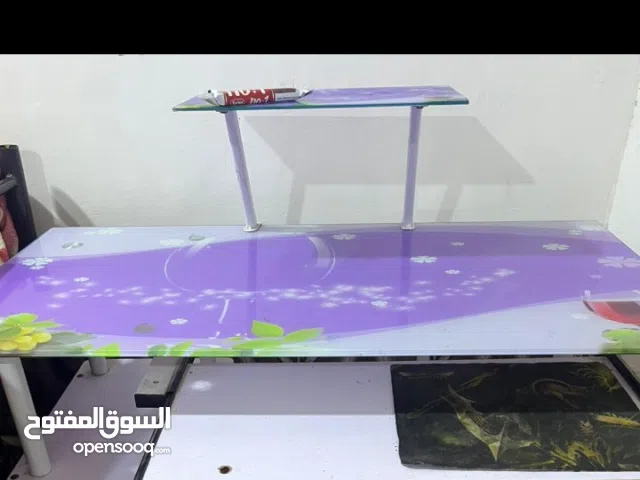 ميز قمينج زجاجي