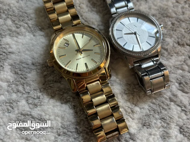 Michael Kors and Armani Exchange Women’s watches. Used but in good condition.