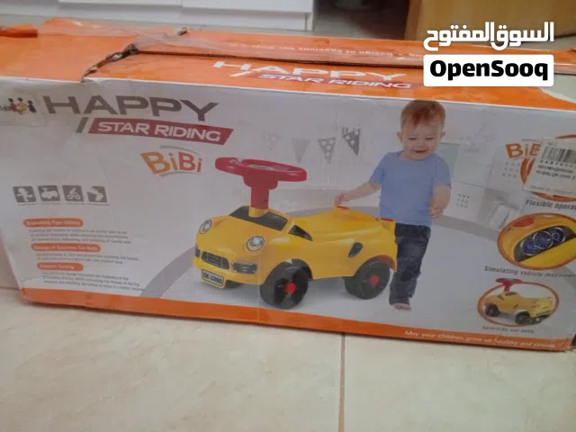 سياره اطفال جديده بكرتونه لم تستعمل مع كامل اغراضها