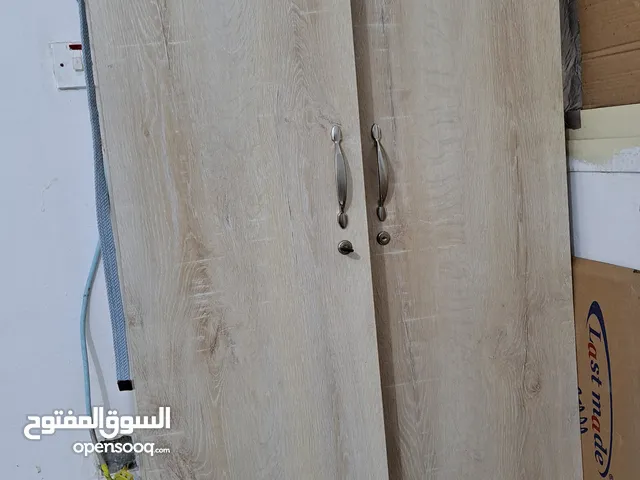 Double door Wooden Cupboard with a single drawer