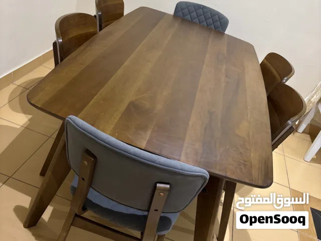 Wooden dining table and chairs excellent condition and barely used size:1m x 1.8m