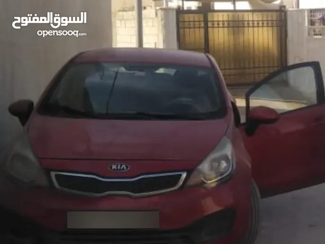 كيا ريو 2015 لون احمر