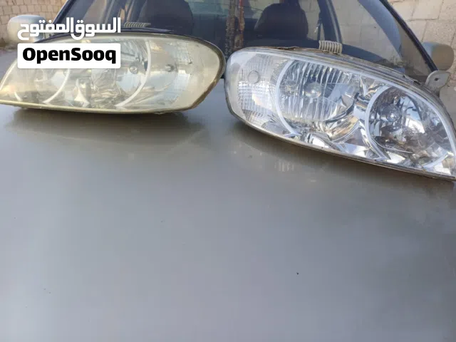 جوز اضواو كيا سبكترا شغلات اصليات مع القواعد
