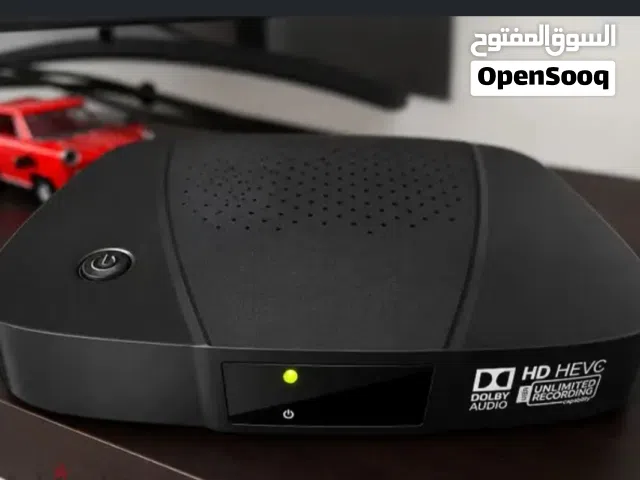 set-top box with dish / digital TV receiver (used for satellite or cable TV).