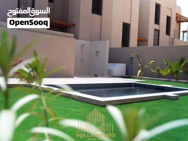 Stylish 3-bedroom duplex in Muscat Bay with sea views, modern finishes, and luxury amenities