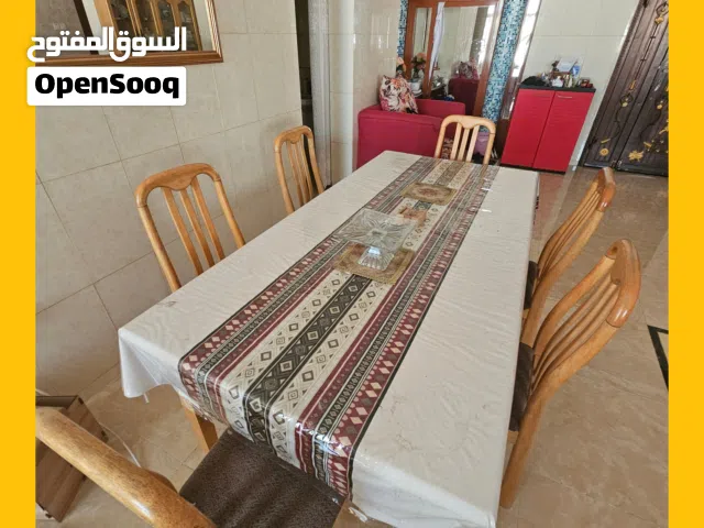 URGENT SALE Dining Table with 6 Chairs and 3 Table covers Free