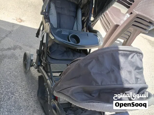 عرباية توأم بحالة الوكالة لون اسود بحالة ممتازة