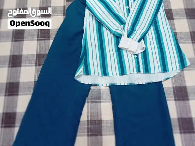 سوت نسائي لون تركواز