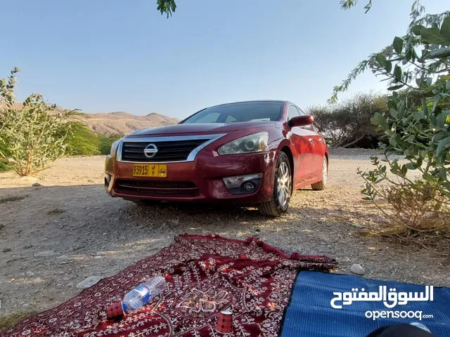 Nisaan Altima 2015 with insurance and registration for 11 months