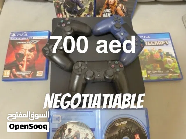 PlayStation 4 slim with 3 controller and games