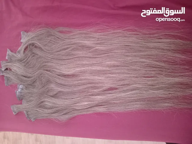 وصله شعر طبيعي ميه بالميه طول 70سم 40 خصله يعني طقمين
