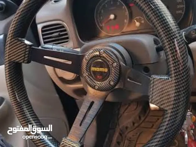 طارة نوع momo اصلية استعمال 3 اسابيع كاربون فايبر استعمال بسيط للببيع