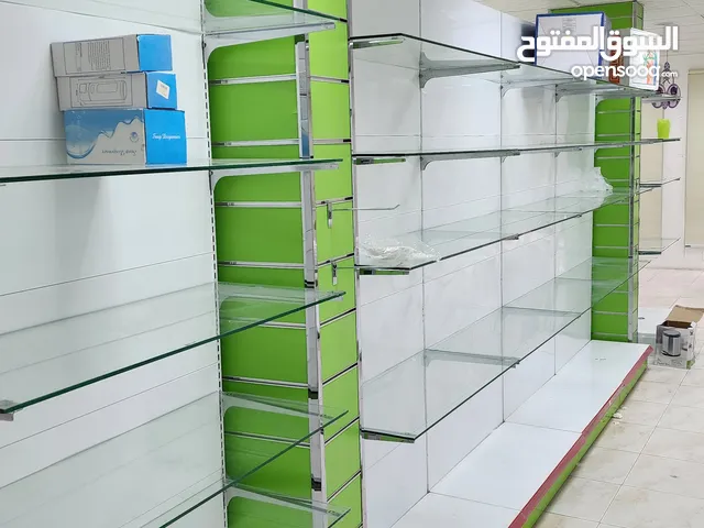 شلفات ورفوف وطاولات عرض وكبتات للمحلات التجاريه